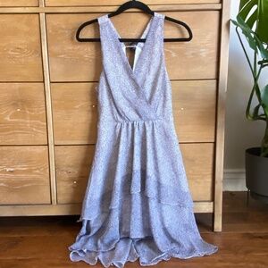 BCBGeneration Blue and white dress with v-neckline and a ruffled skirt, Size 2